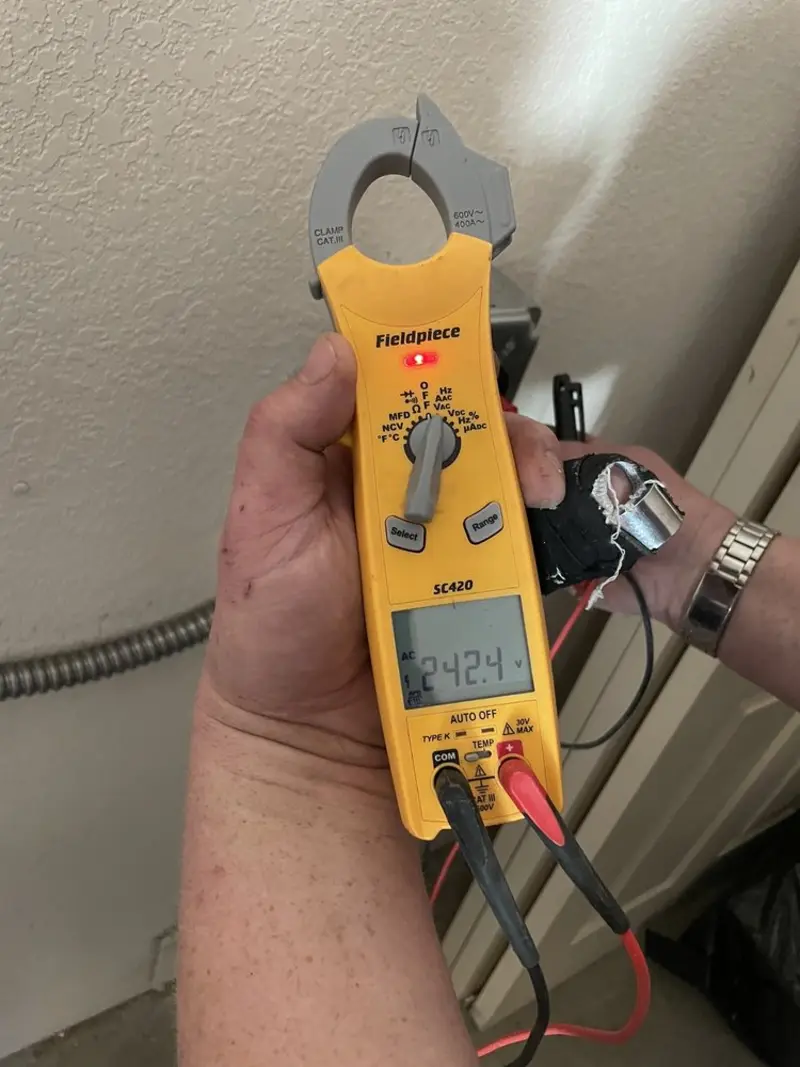 Voltage testing with clamp meter during Circuit Breaker Repair in Fayetteville